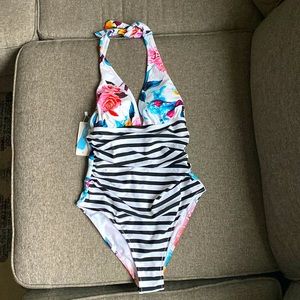 Cupshe halter swimsuit w/ floral print and black and white stripe.